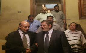 صورة ارشيفية لرئيس الديوان السابق مع الرئيس المعزول - أوراق عربية